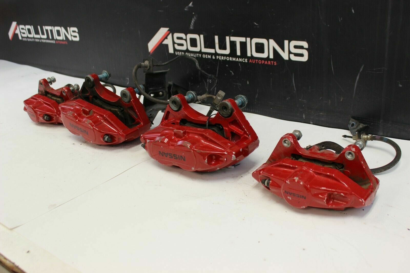 NISSAN 370Z AKEBONO CALIPERS FRONT REAR SET 2009-2020 OEM RED