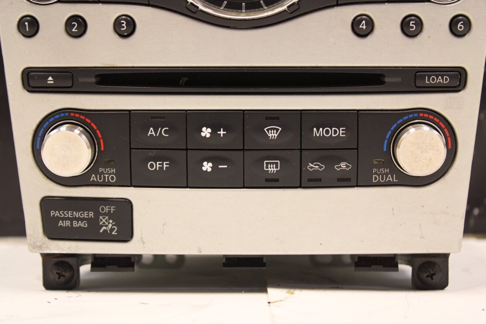 07-08 INFINITI G35 G37 DASH RADIO TEMPERATURE CONTROL BEZEL OEM USED