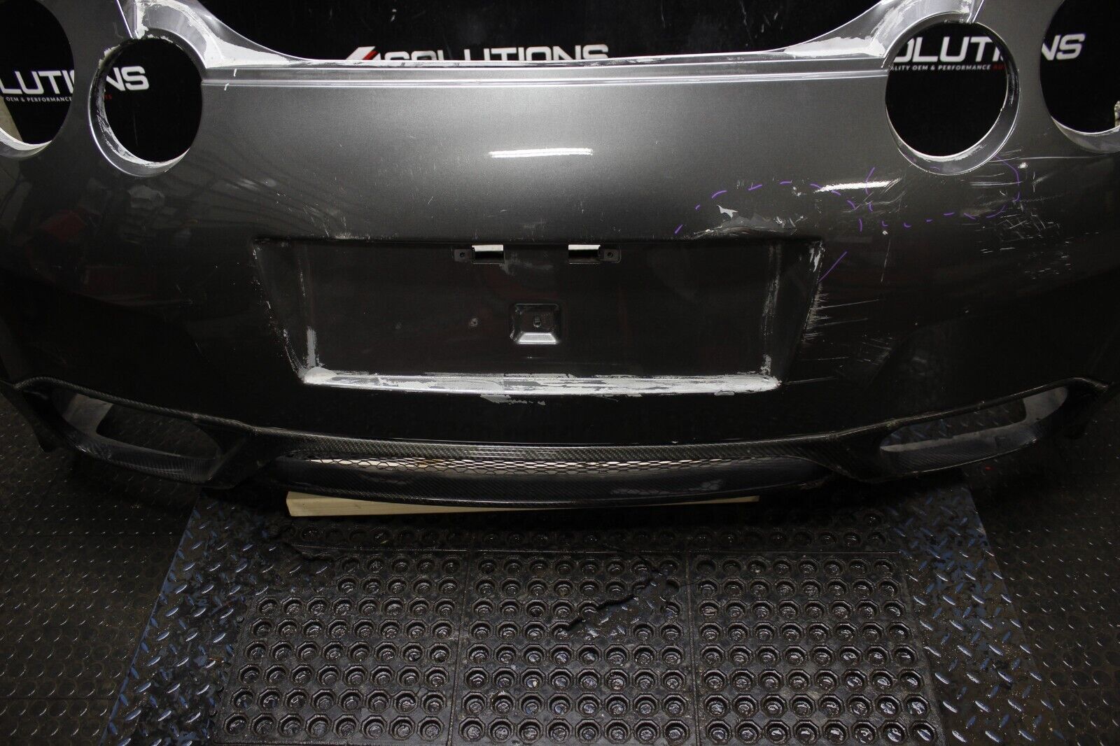 2009-2015 NISSAN GTR GT-R R35 REAR BUMPER COVER OEM W/ SEIBON VALENCE *DAMAGE*