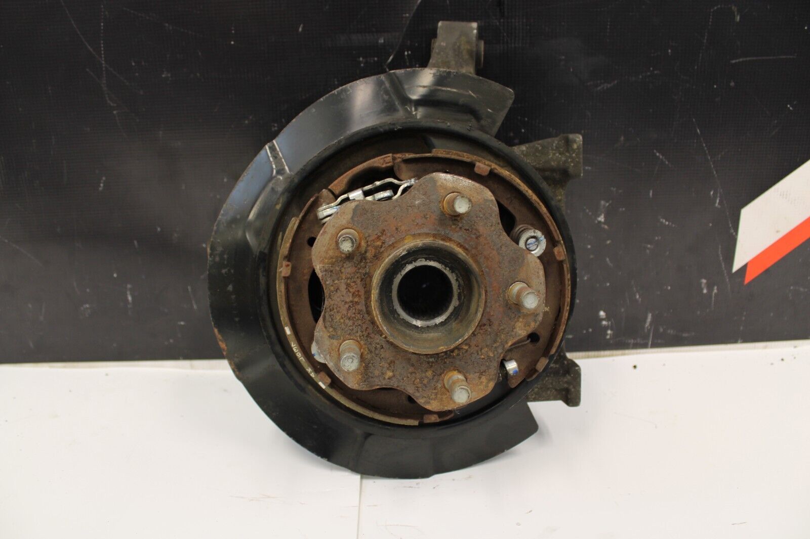 2009 Nissan GT-R R35 Rear LH Left Driver Knuckle Spindle Arm Knee Assembly OEM